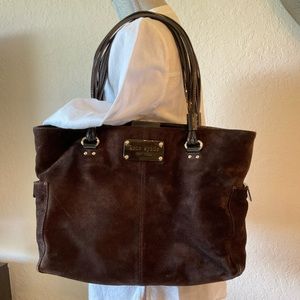 Kate Spade bag dark brown, Suede,very good shape and a lot of  packets inside .